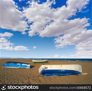 Valencia La Malvarrosa beach arenas beached boats in Spain