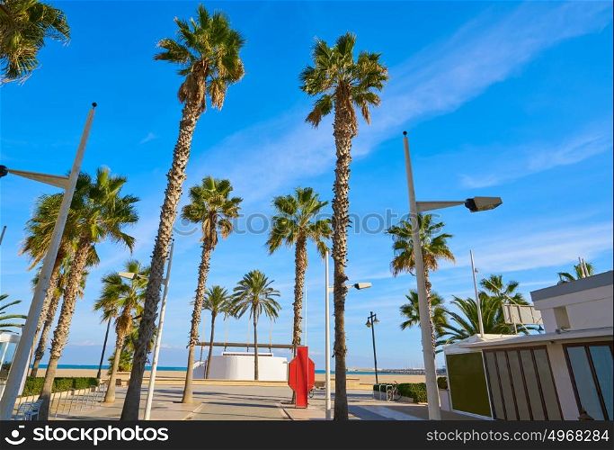 Valencia La Malvarrosa beach arenas palm trees in Spain