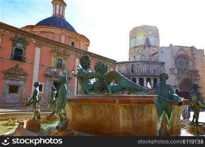 Valencia Plaza de la Virgen square and Neptune fountain statue in Spain