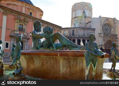 Valencia Plaza de la Virgen square and Neptune fountain statue in Spain