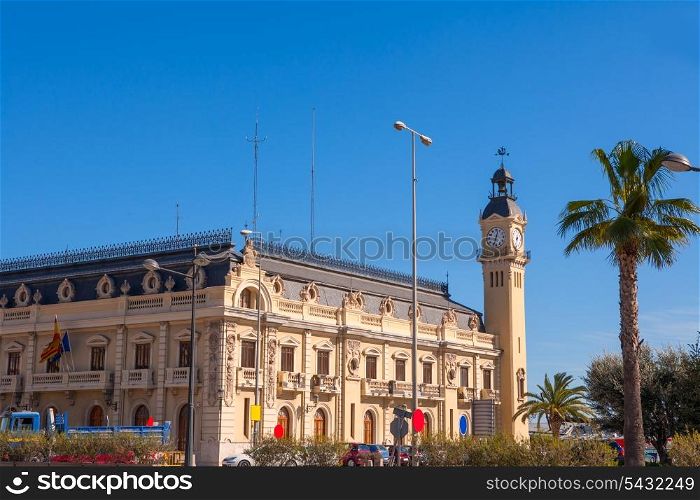 Valencia Port building with tower and palm tree in Mediterranean Spain