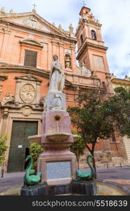 Valencia Santo Tomas church in plaza san Vicente Ferrer with fountain at Spain