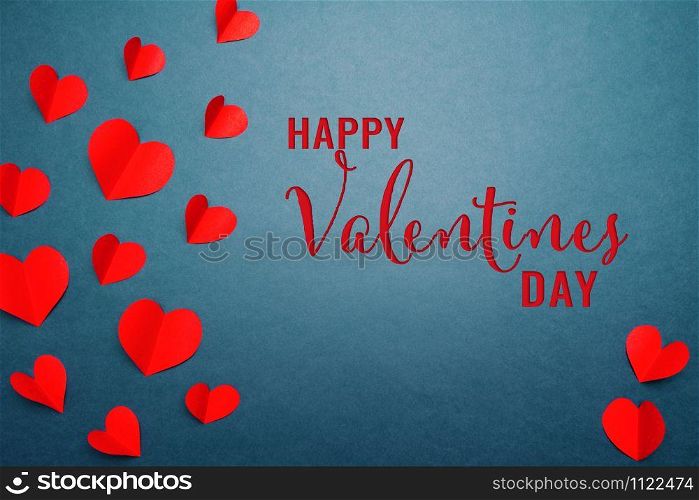 Valentine card with red heart on blue background, abstract, flat lay, top view