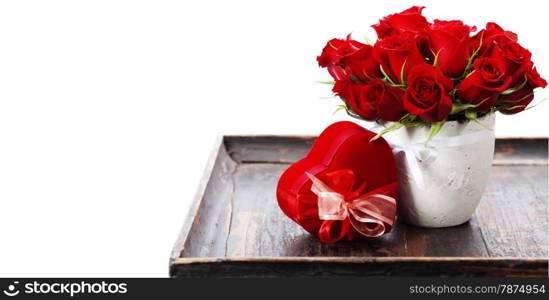 Valentine composition with roses and gift box over white