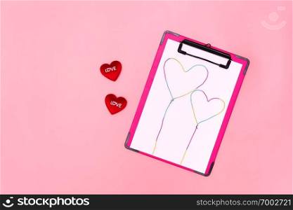 Valentine Day concept, white note with red hearts on pink background
