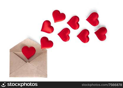 Valentine day love letter, envelope of white paper with red hearts heap spread on white background.. Valentine day love letter