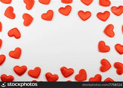 Valentine day white wood background with red hearts background. Valentines day or love concept, copy space. Valentine day white wood background