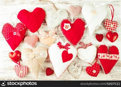 Valentine handmade hearts on the shabby wooden table. Valentine handmade heart