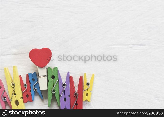 Valentine, love and wedding background concept. Red heart on white wood table. Picture for add text message. Backdrop for design art work.