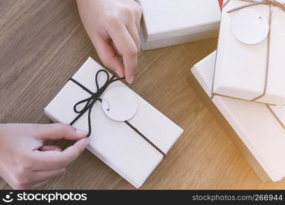 Valentine present. Gift box and red ribbon for romantic couple