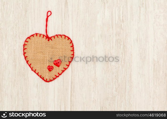 Valentine red hearts on grey wooden background