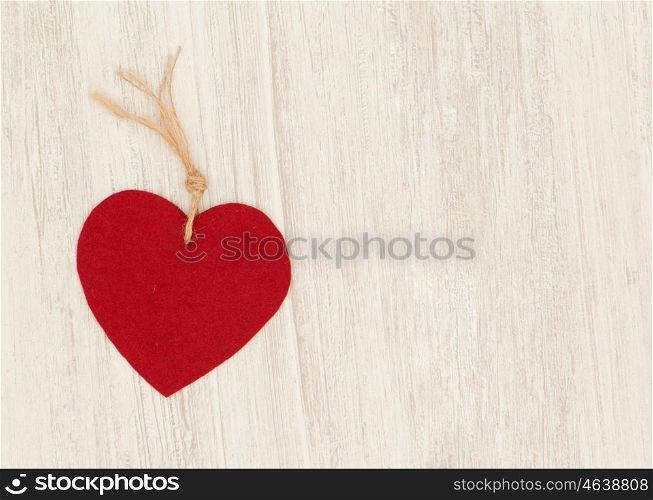 Valentine red hearts on grey wooden background