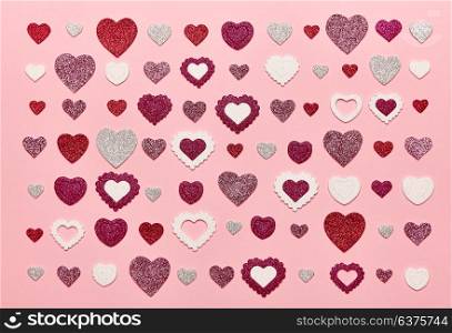 Valentine&rsquo;s Day Background. Red Hearts on a Pink background. Flat Lay. St.Valentine&rsquo;s Day Wallpaper. Love concept