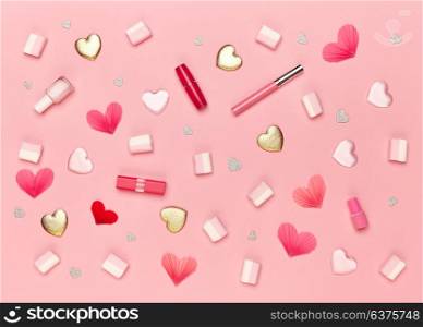 Valentine&rsquo;s Day Background. Red Hearts on a Pink background. Flat Lay. St.Valentine&rsquo;s Day Wallpaper. Women Accessories. Lipstick and nail Polish