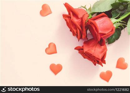 Valentine&rsquo;s day background,Red rose with red hearts on pink background,For card and wedding background. Copyspace. Valentine&rsquo;s day background,Red rose with red hearts on pink background,For card and wedding background