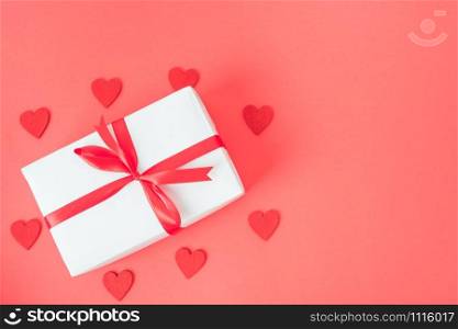 Valentine&rsquo;s Day background, Top view Flat lay Red heart round frame gift box on red background. Valentines day concept with copy space