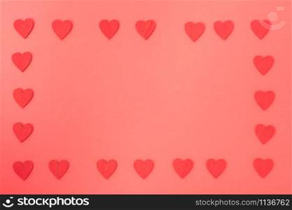 Valentine&rsquo;s Day background, Top view Flat lay Red heart round frame on red background. Valentines day concept with copy space