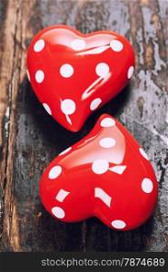 Valentine&rsquo;s day composition with hearts on wooden background