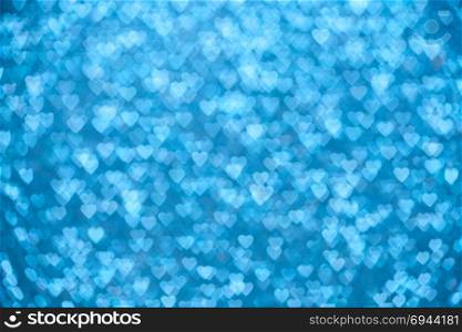 Valentine&rsquo;s Day Concept: Blue Sparklng Defocused Romantic Background of Lights Hearts..