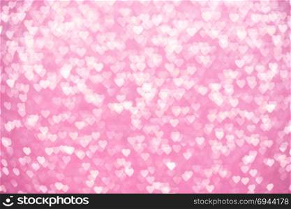 Valentine&rsquo;s Day Concept: Pink Sparklng Defocused Romantic Background of Lights Hearts..