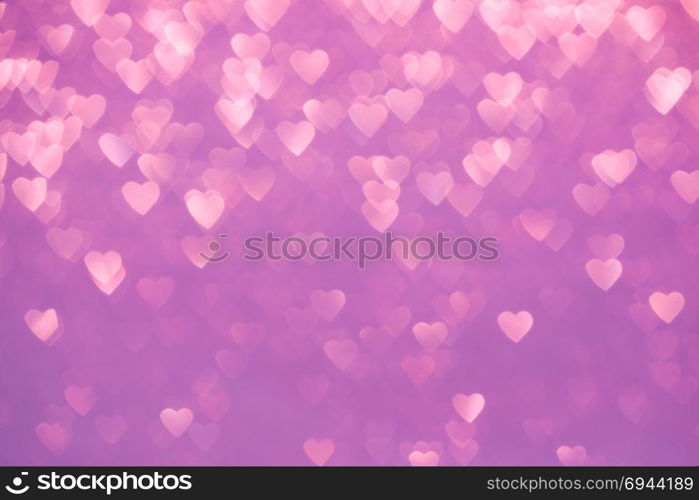 Valentine&rsquo;s Day Concept: Pink Sparklng Defocused Romantic Background of Lights Hearts..