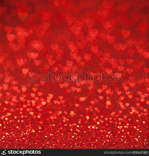 Valentine&rsquo;s Day Concept: Red Sparklng Defocused Romantic Background of Lights Hearts..