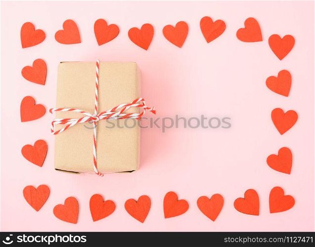 Valentine&rsquo;s Day Concept, Top view Flat lay, red heart and gift box on Pink background with copy space for your text