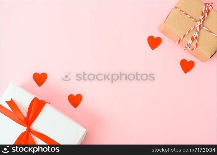 Valentine&rsquo;s Day Concept, Top view Flat lay, red heart and gift box on Pink background with copy space for your text