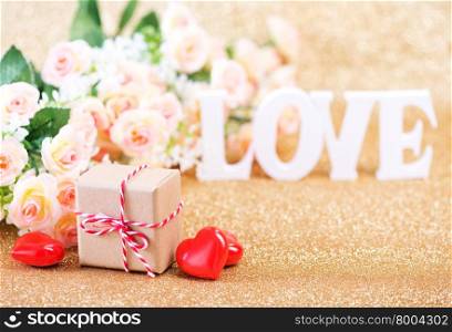 "Valentine&rsquo;s day concept with gift box and letters "love""