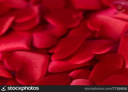 Valentine&rsquo;s day many red silk hearts background, love concept. Valentine&rsquo;s day red silk hearts