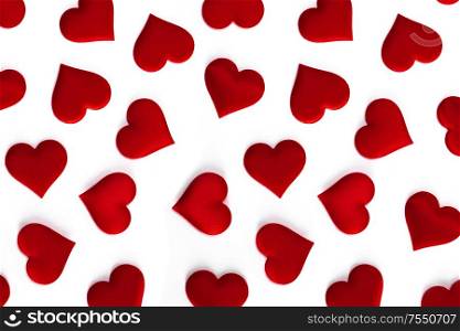 Valentine&rsquo;s day many red silk hearts isolated on white background, love concept. Valentines day hearts on white