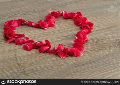 Valentine's Day. A heart made out of red rose petals