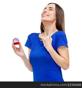 Valentine’s Day. Beautiful woman holding heart shaped box with ring. Beautiful woman holding heart shaped box with ring
