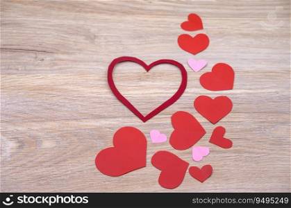 Valentine’s Day, carved red and pink hearts, red hearts in honor of February 14. carved red and pink hearts, red hearts in honor of February 14, Valentine’s Day