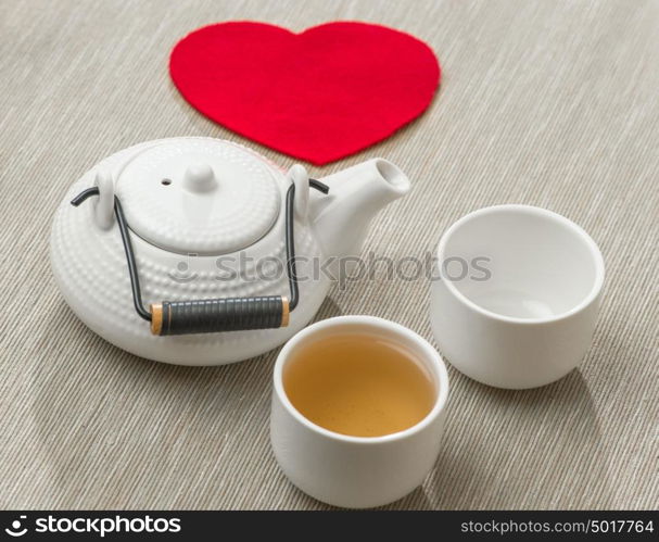 Valentine's day surprice for couple. Romantic tea set with red heart