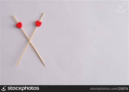 Valentine's Day. Two red hearts on sticks