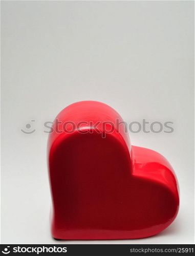 Valentines day. A red heart isolated against a white background