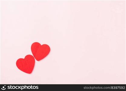 Valentines’ day background. red hearts composition greeting card for love Valentines day concept isolated on pink background with copy space. Top View flat lay from above