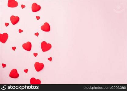 Valentines’ day background. red hearts composition greeting card for love Valentines day concept isolated on pink background with copy space. Top View flat lay from above