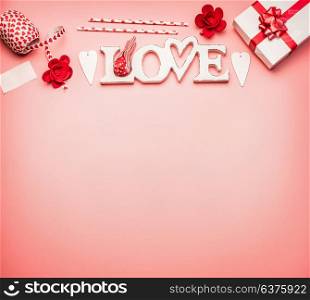 Valentines day background with flat lay border of word Love, hearts, gift box with red ribbon and greeting decoration, top view, place for text