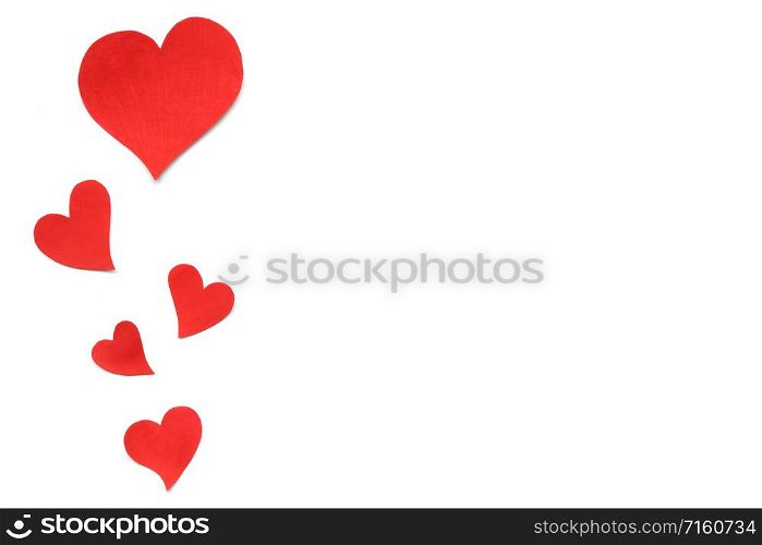 Valentines Day card background, border of red cute hearts made of paper. White background with hearts in paper cut in different size. Valentine Day romantic. Copyspace. Valentines Day card background, red cute hearts made of paper. White background with hearts in paper cut in different size. Valentine Day romantic. Copyspace