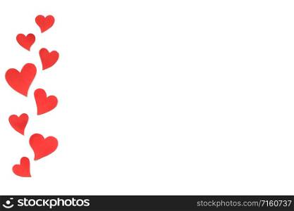 Valentines Day card background, border of red cute hearts made of paper. White background with hearts in paper cut in different size. Valentine Day romantic. Copyspace. Valentines Day card background, red cute hearts made of paper. White background with hearts in paper cut in different size. Valentine Day romantic. Copyspace