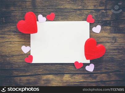 Valentines day card romantic on wooden / Envelope love mail Valentine Letter Card with Red Heart Love concept - Invitation card Wedding on wood background top view copy space