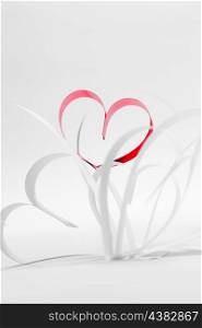Valentines day card with paper and ribbon hearts on white