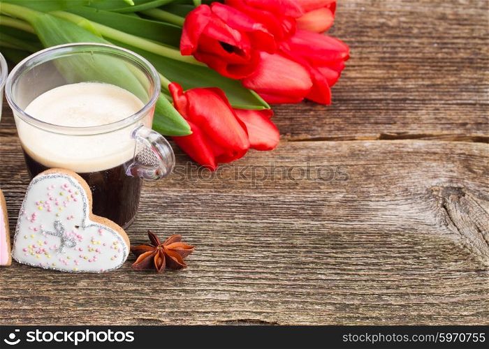 Valentines day coffee. Valentines day coffee with fresh tulips on wooden table