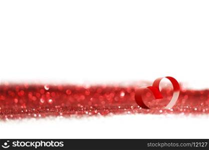 Valentines day decorative heart on red glitter background