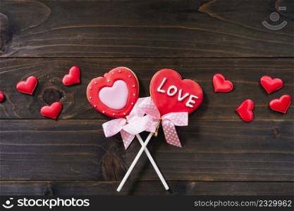 Valentines day heart shaped cookies on wooden table background with copy space.