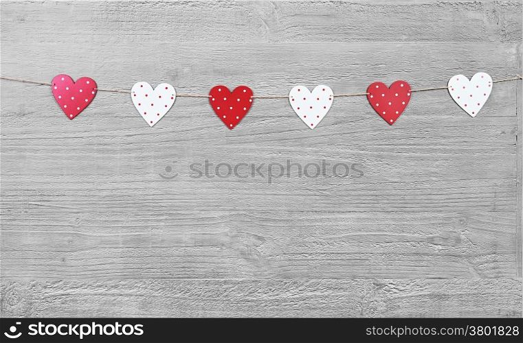 Valentines Day hearts on vintage wooden background as Valentines Day symbol