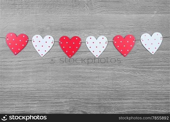 Valentines Day hearts on vintage wooden background as Valentines Day symbol