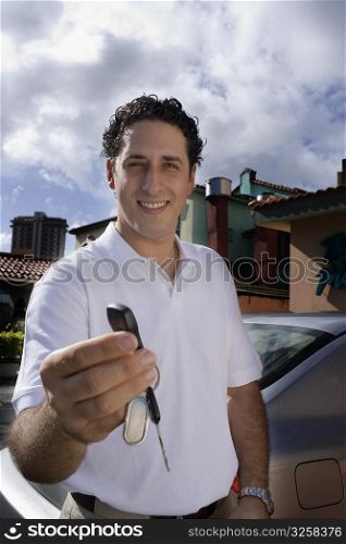 Valet parker holding car keys